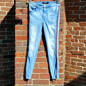 Express skinny jeans with rainbow accents Pride jeans